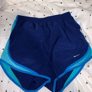 TWO PAIRS OF NIKE DRY FIT TEMPO SHORTS